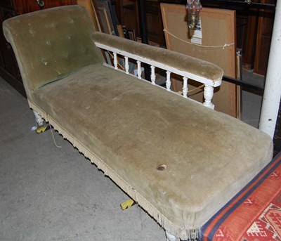 Lot 783 - A 19th century white-painted daybed with green...