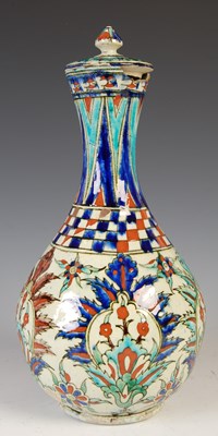 Lot 900 - A Turkish Kutahya pottery bottle vase and...