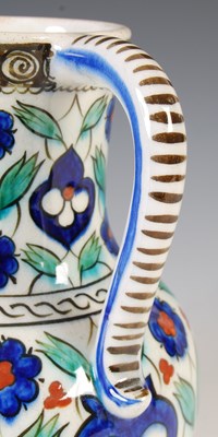 Lot 904 - A Cantagalli Iznik-style pottery ewer, late...