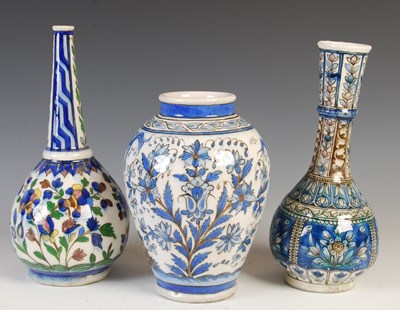 Lot 469 - A group of Persian Qajar pottery, 19th century,...