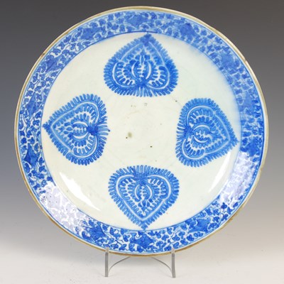 Lot 897 - A large Qajar Isfahan Persian pottery charger,...