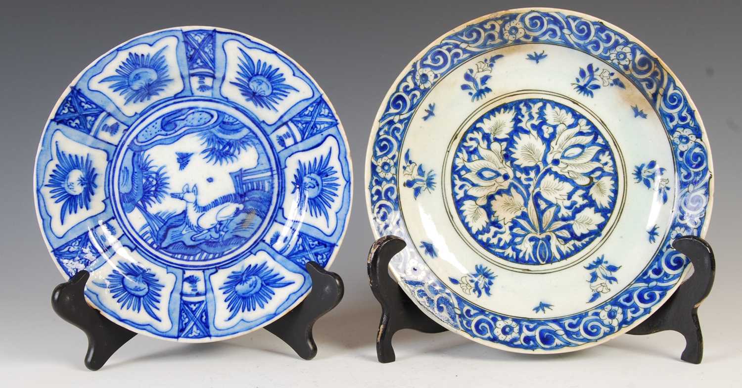 Lot 881 - Two Persian Safavid Kirman Chinese style blue...