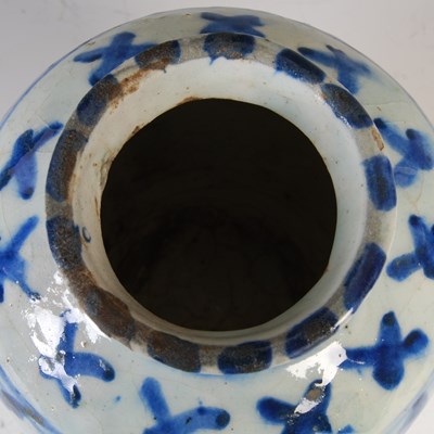 Lot 879 - A Persian pottery blue and white vase, 19th...