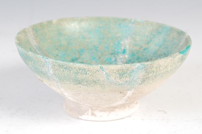 Lot 903 - An early Persian pottery conical bowl,...