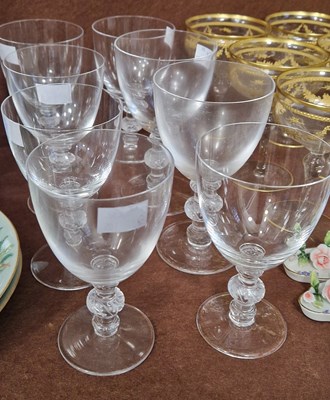 Lot 18 - A set of eight Lalique clear glass wine...