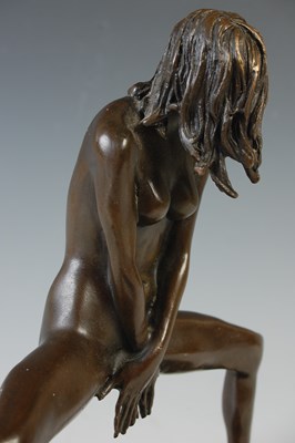 Lot 28 - Laude, a contemporary bronze figure of a naked...