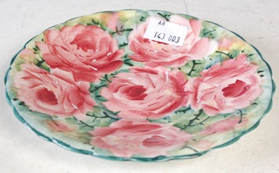 Lot 33 - A Wemyss pottery saucer, decorated with roses...