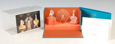 Lot 36 - A boxed set of three modern Lalique clear and...