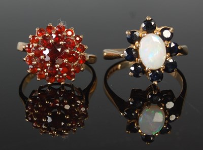 Lot 65 - A 9ct gold and garnet cluster ring, size N1/2,...