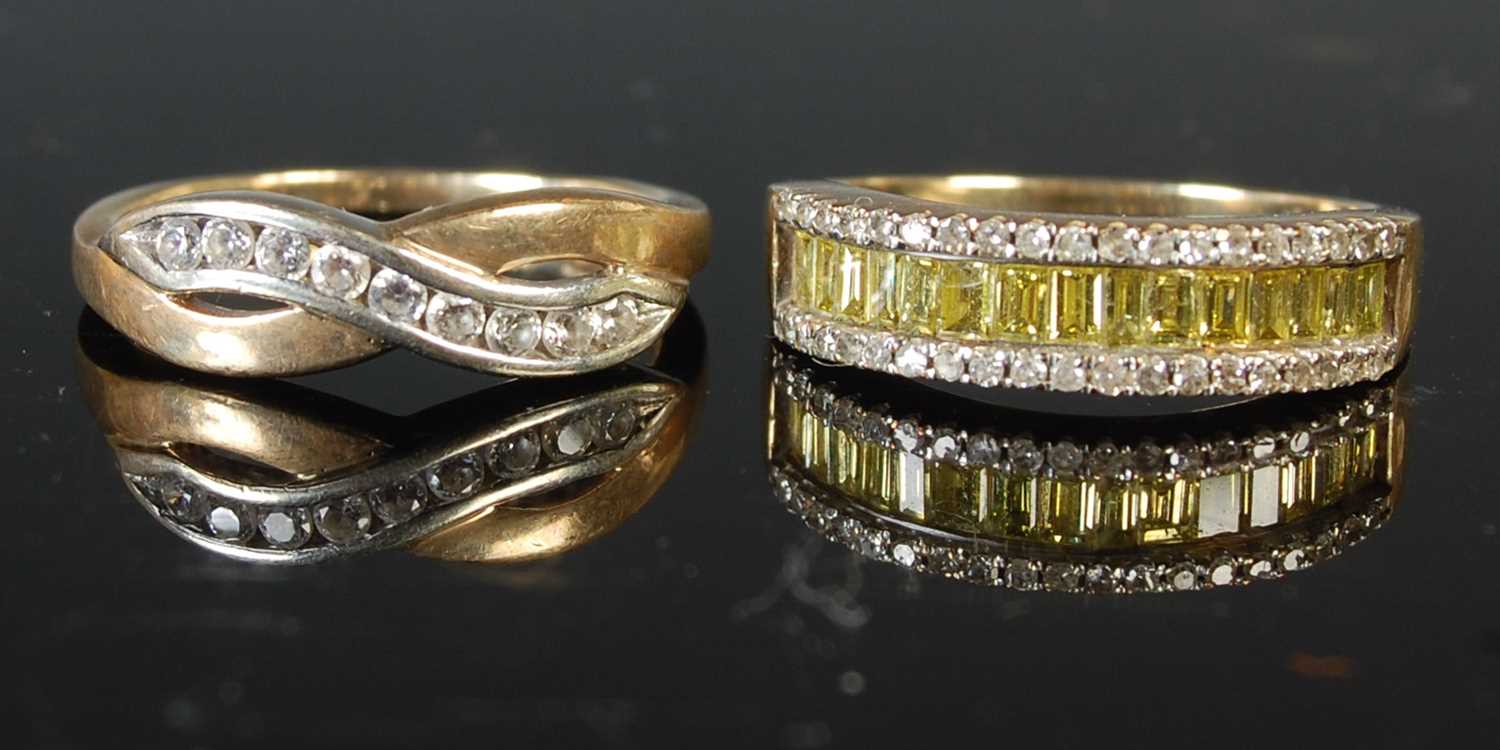 Lot 66 - A 9ct gold and nine stone diamond chip ring,