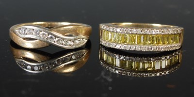 Lot 66 - A 9ct gold and nine stone diamond chip ring,...