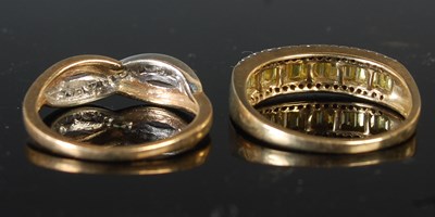 Lot 66 - A 9ct gold and nine stone diamond chip ring,...