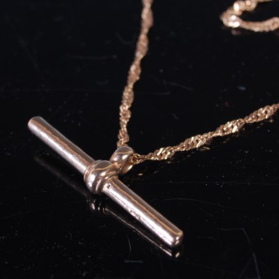 Lot 75 - A 9ct rose gold necklace with T-bar suspension,...