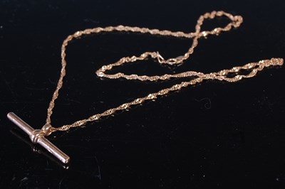 Lot 75 - A 9ct rose gold necklace with T-bar suspension,...