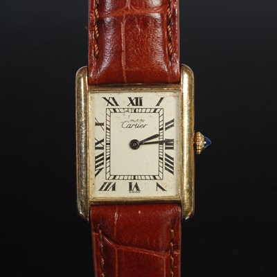 Lot 83 - Must De Cartier, a silver gilt wristwatch, the...