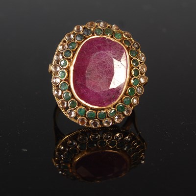 Lot 87 - An Indian yellow metal, ruby, emerald and...