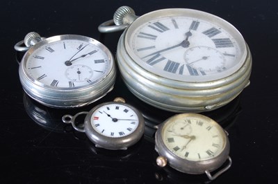 Lot 94 - A white metal Goliath pocket watch, 69.5mm...