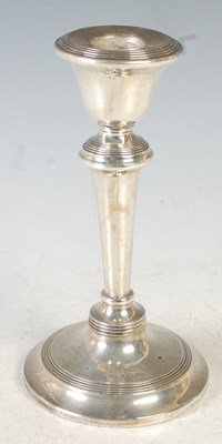 Lot 137 - A Chester silver candlestick, loaded, 17cm high.