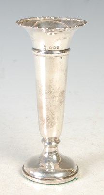 Lot 139 - A London silver bud vase, loaded, 15.5cm high.