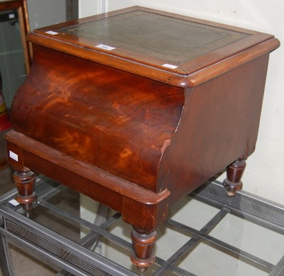 Lot 599 - A Victorian mahogany commode with hinged top...