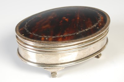 Lot 198 - A silver and tortoiseshell oval shaped...