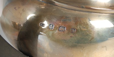 Lot 201 - A Birmingham silver three piece tea set, gross...