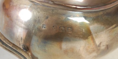 Lot 201 - A Birmingham silver three piece tea set, gross...