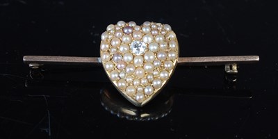 Lot 208 - A yellow metal, split pearl and diamond chip...