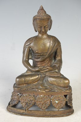 Lot 218 - A Chinese bronze figure of Buddha, 14.5cm high.