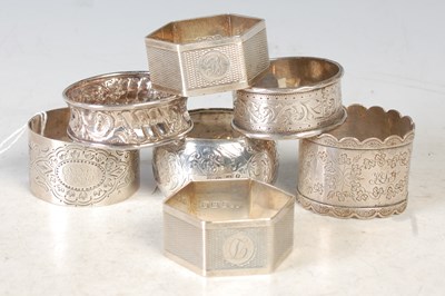 Lot 241 - A collection of seven assorted napkin rings.