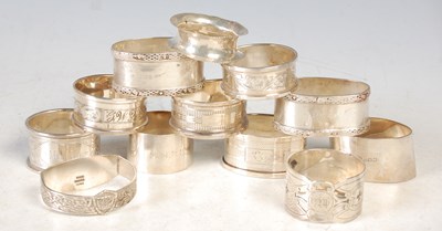 Lot 264 - A collection of twelve assorted silver napkin...