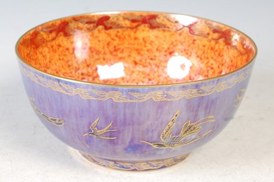 Lot 275 - A Wedgwood blue and orange ground lustre bowl,...