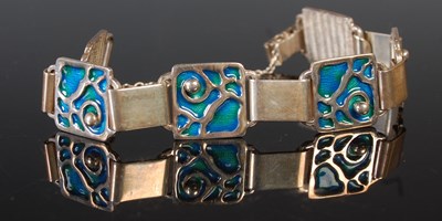 Lot 294 - A sterling silver and enamel panel bracelet,...