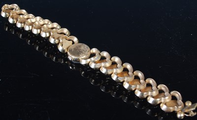 Lot 308 - A ladies 18ct gold bracelet watch by Omega,...