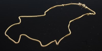 Lot 316 - A yellow metal necklace stamped '585', 5.2 grams.