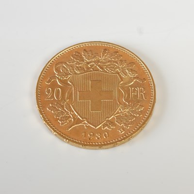 Lot 319 - A Swiss gold 20 Franc coin, dated 1930.