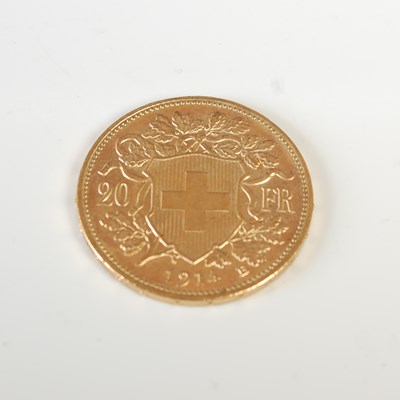 Lot 320 - A Swiss gold 20 Franc coin, dated 1914.