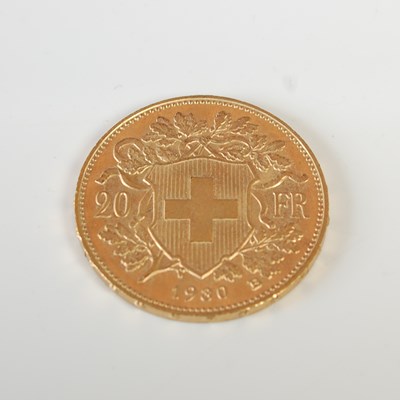 Lot 321 - A Swiss gold 20 Franc coin, dated 1980.