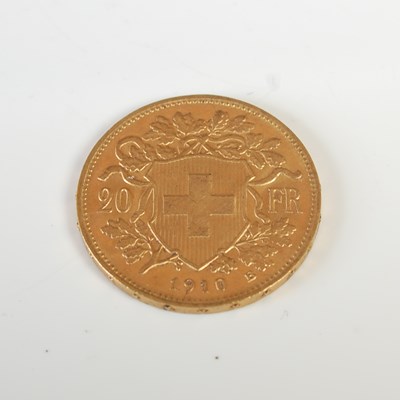 Lot 322 - A Swiss gold 20 Franc coin, dated 1910.