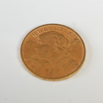 Lot 322 - A Swiss gold 20 Franc coin, dated 1910.