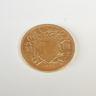 Lot 323 - A Swiss gold 20 Franc coin, dated 1922.