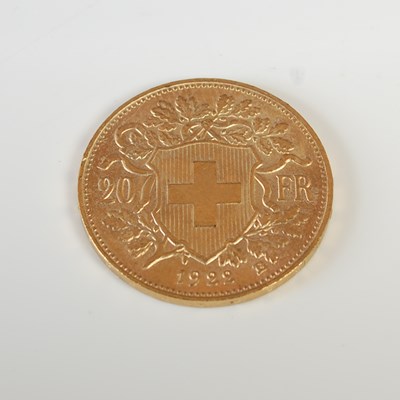 Lot 324 - A Swiss gold 20 Franc coin, dated 1922.