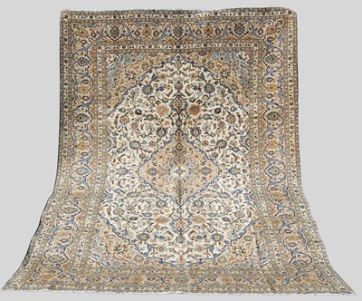 Lot 116 - A Persian Kashan carpet, the off-white...