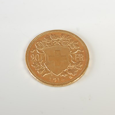 Lot 328 - A Swiss gold 20 Franc coin, dated 1914.