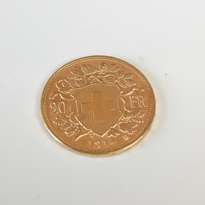 Lot 331 - A Swiss gold 20 Franc coin, dated 1914.