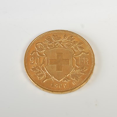 Lot 334 - A Swiss gold 20 Franc coin, dated 1900.