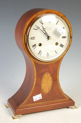 Lot 347 - Comitti, London, a mahogany mantle clock in...