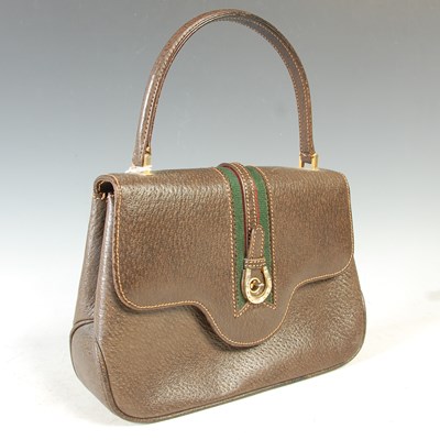 Lot 370 - Gucci, a vintage brown leather handbag with...