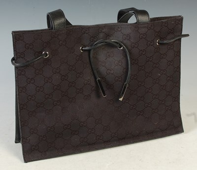 Lot 371 - Gucci, a vintage GG monogram tote bag in black,...