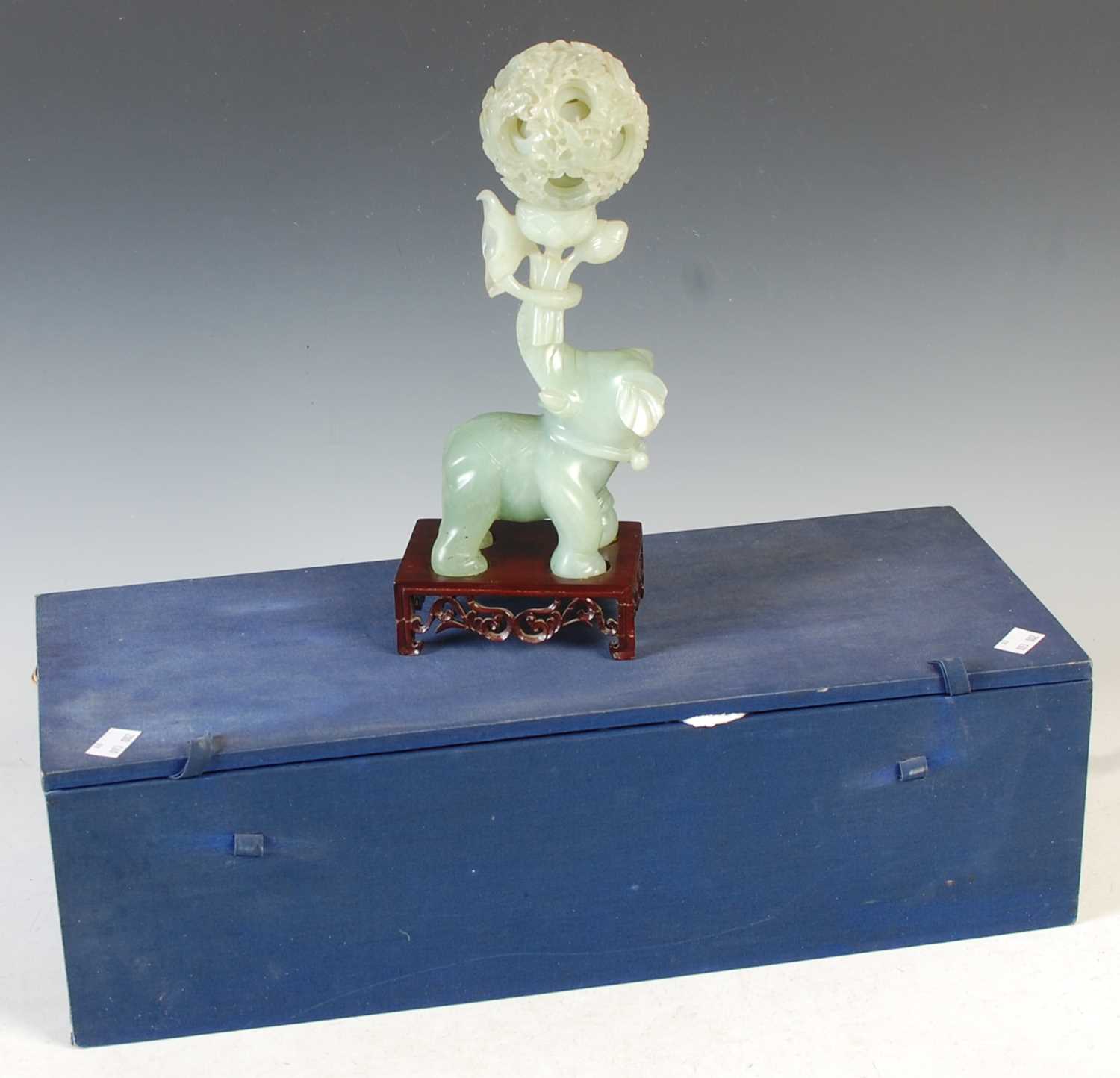 Lot 386 - A Chinese green stone carving of an elephant...